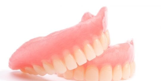 Dentures stacked on each itger